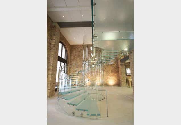 Apple provide glass staircase inspiration with their Covent Garden store's spiral glass staircase