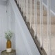 staircase with acrylic railings