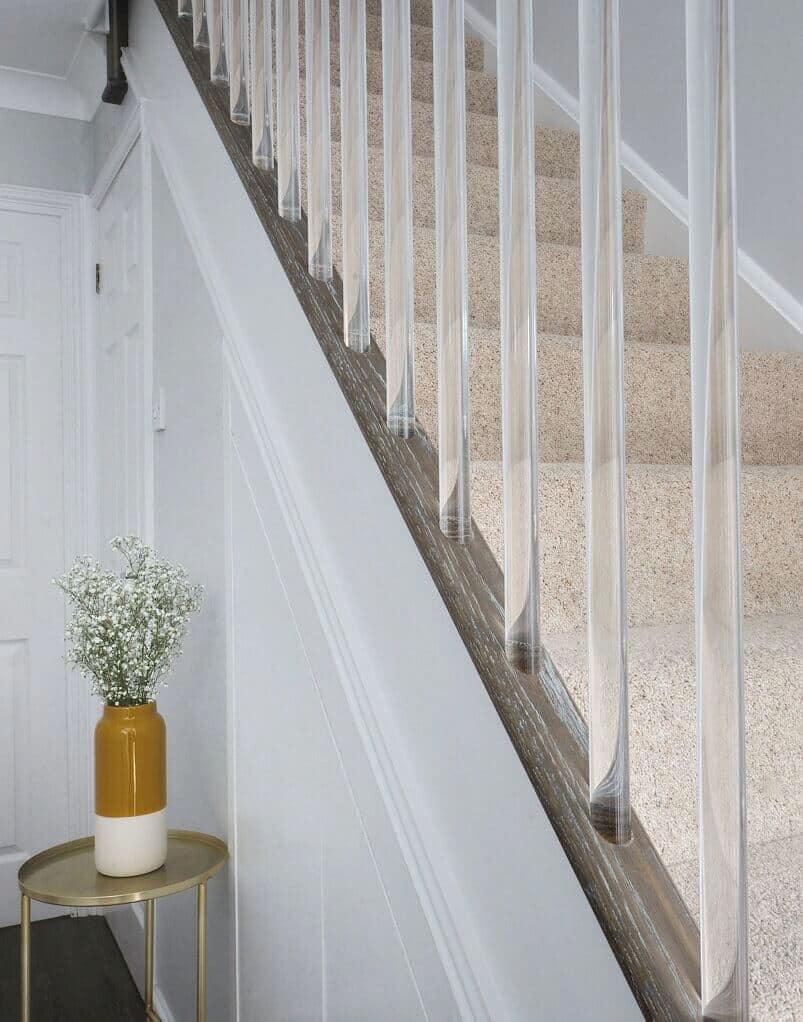 staircase with acrylic railings