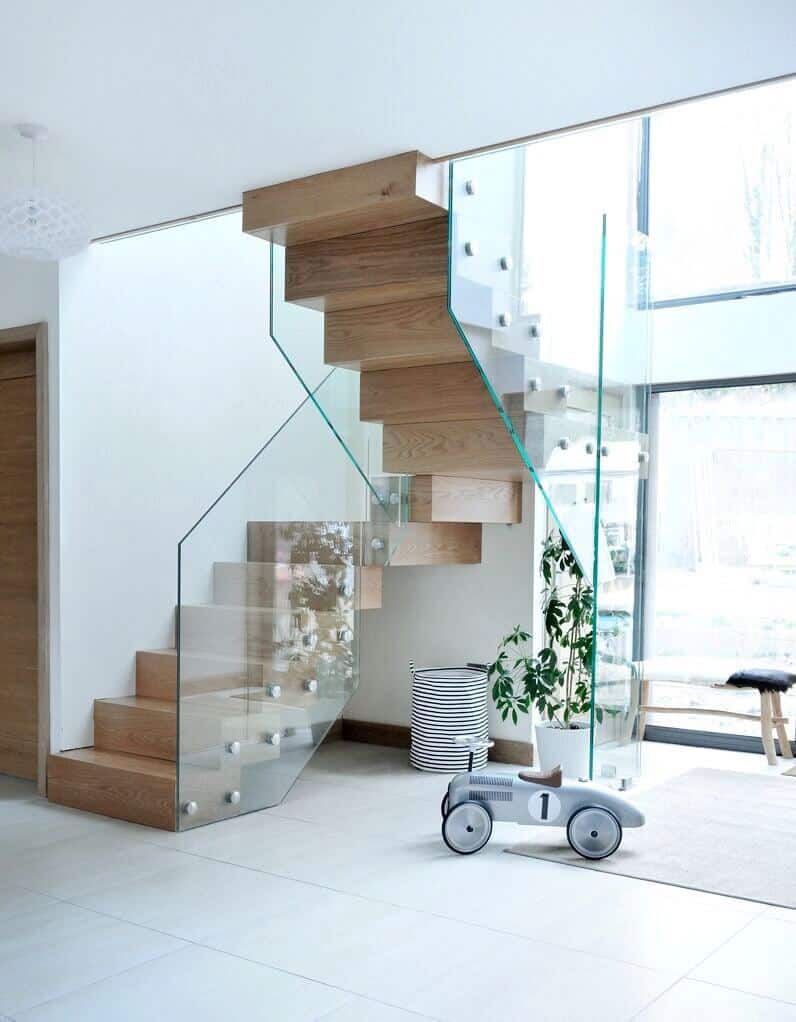 modern staircase with glass bannister