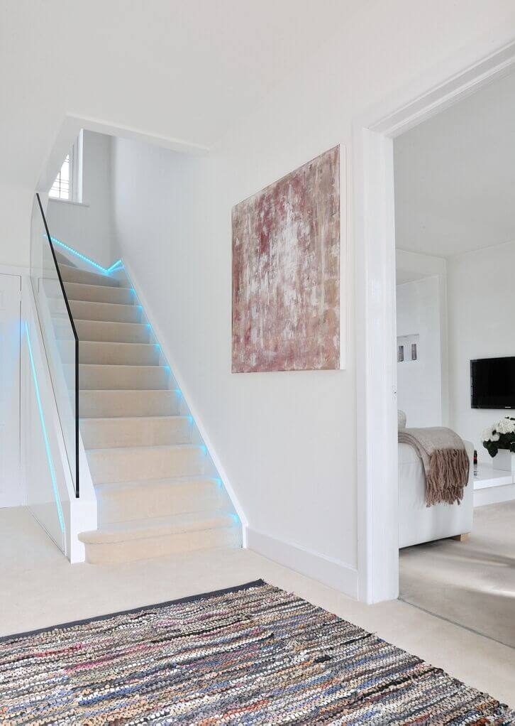 modern white staircase with LED lighting