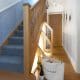 wine cellar under carpeted staircase