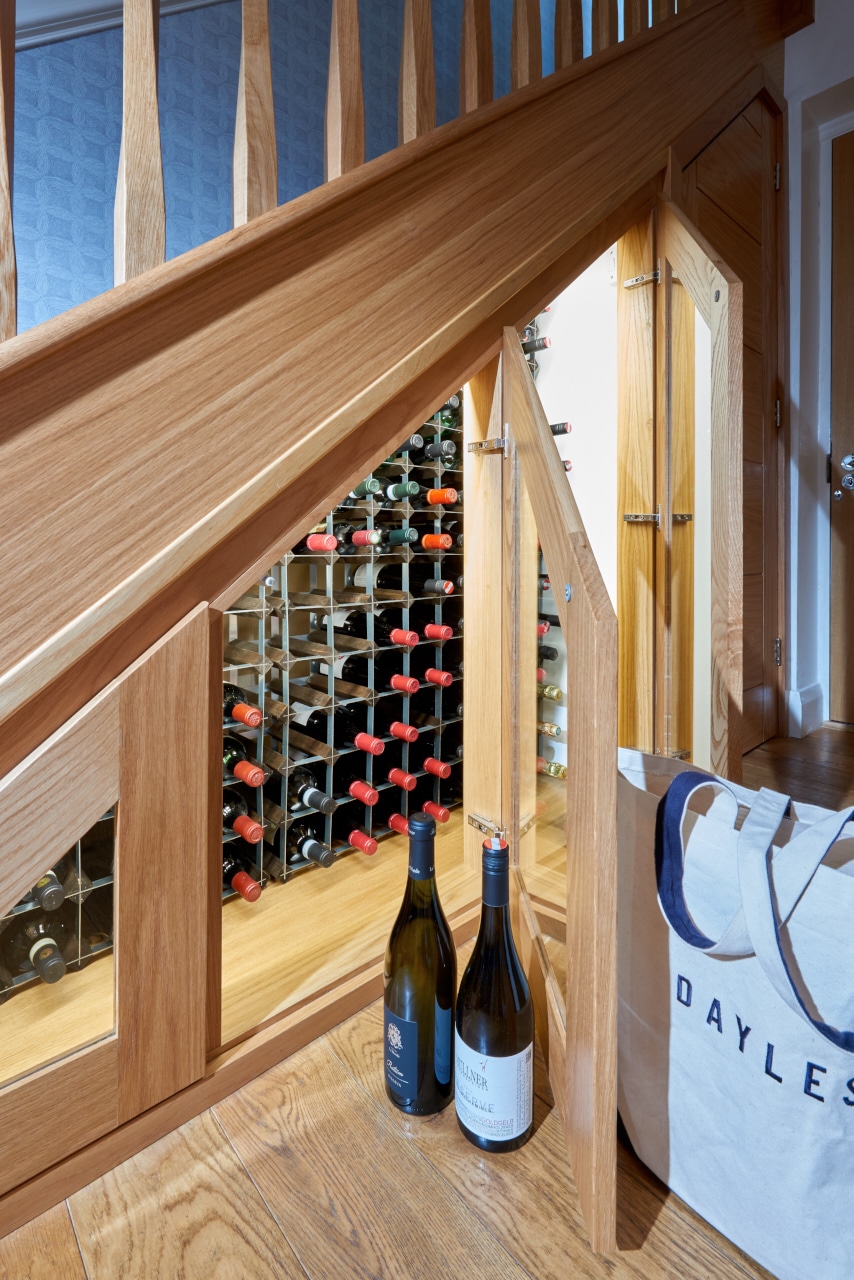 wine cellar under stairs