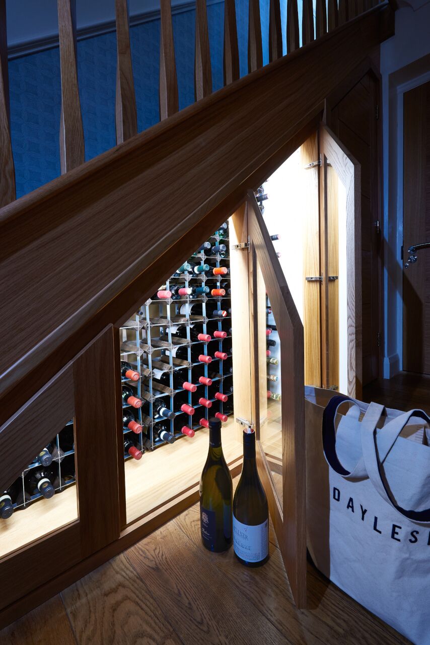 wine cellar under staircase