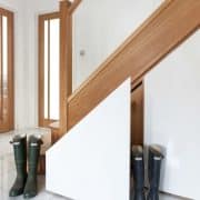 classic wooden staircase with storage